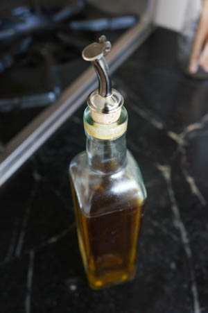 capped olive oil pourer