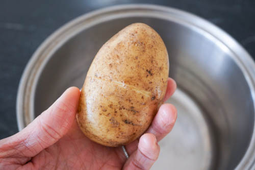 scored potato
