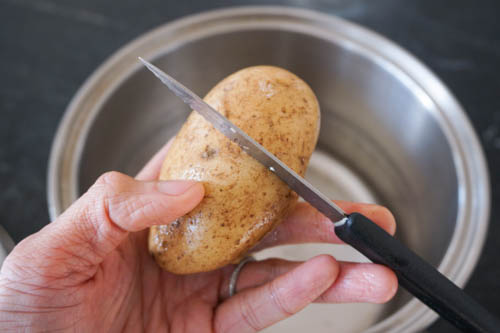 scoring potato skin